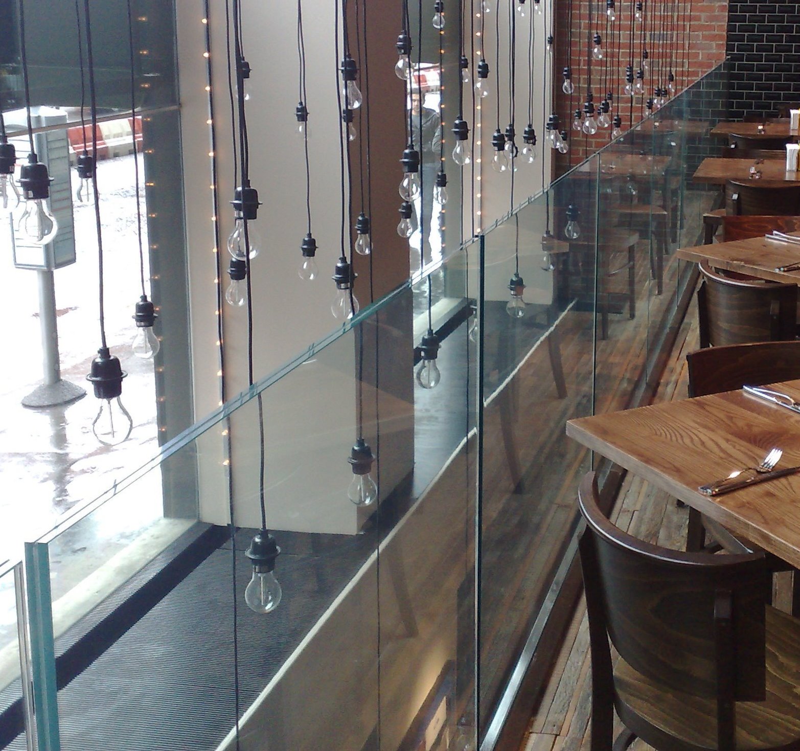 Freestanding glass balustrade in hospitality setting